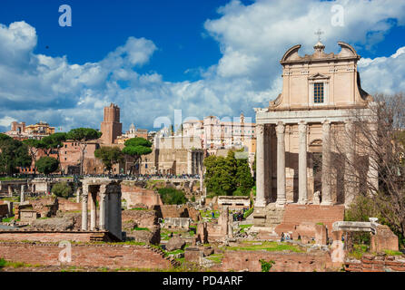 Sightseeing in Rome. Tourists visit Roman Forum ancient ruins Stock Photo