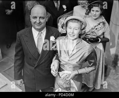 2nd june 1949. London, England. AUSTRALIAN  MILLIONAIRE WEDS IN LONDON. Mr. George Falkiner, a 42 year old Australian millionaire sheep farmer marries Miss Pauline Weir, from Mew South Wales, Australia, at the Savoy Chapel in London. Mr. Falkiner owned one of the best sheep studs in Australia, and was a company director, promotor, inventor, racehorse owner and pilot. the photo shows the bride and groom leaving after their wedding ceremony. Stock Photo