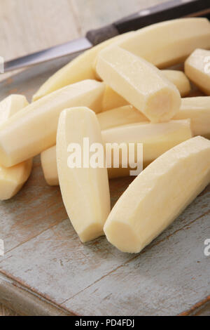 preparing fresh parsnips Stock Photo