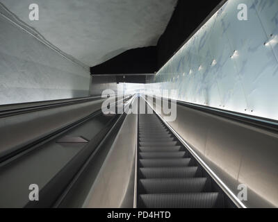 Helsinki Metro system running from eastern to western suburbs in Finlands capital, escalators from the deep station at Koivusaaren Stock Photo