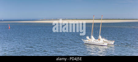 Panorama of a catamaran near the island of Borkum, Germany Stock Photo