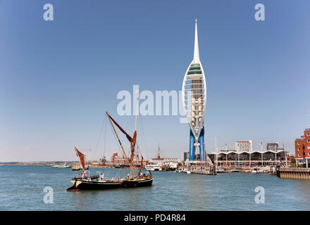 The Thames Barge 'Alice' sails into Portsmouth Harbour, with the Spinnaker Tower in the background.