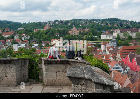 05.06.2017, Tuebingen, Baden-Wuerttemberg, Germany, Europe - A man and a woman enjoy the view from the Castle Hohentuebingen over Tuebingen's old town Stock Photo