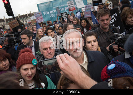 Westminster Bridge, London, UK. 26th April 2016. Jeremy Corbyn and John McDonnell join hundreds of striking junior doctors march from St Thomas's hosp Stock Photo