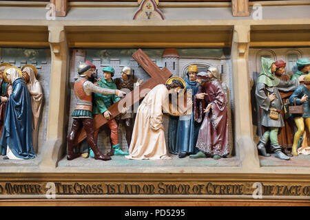 The rood screen with the stations of the cross, at Pugin's Church and Shrine of St Augustine's, in Ramsgate, on the Isle of Thanet, Kent, UK Stock Photo