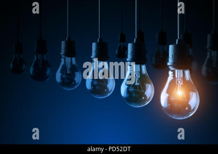Lightbulbs on blue background, idea concept Stock Photo