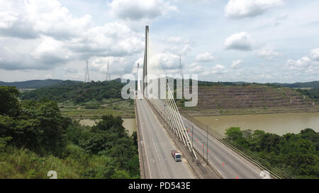 Aerial view of Centennial Bridge across the Panama Canal looking towards the South side of Panama Stock Photo