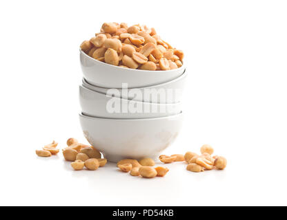 Salted roasted peanuts in bowl isolated on white background. Stock Photo
