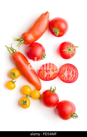 Tasty various tomatoes isolated on white background. Stock Photo