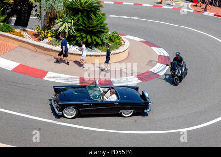 1955 Black Ford Thunderbird Convertible on Circuit de Monaco and the entrance of the Fairmont Hairpin street circuit of Monte Carlo Stock Photo