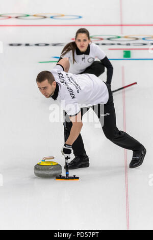 Anastasia BRYZGALOVA  and Aleksandr KRUSHELNITCKII  (OAR) competing in the Mixed Doubles Curling round robin at the Olympic Winter Games PyeongChang 2 Stock Photo