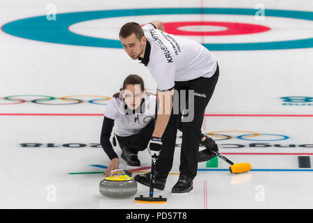 Anastasia BRYZGALOVA  and Aleksandr KRUSHELNITCKII  (OAR) competing in the Mixed Doubles Curling round robin at the Olympic Winter Games PyeongChang 2 Stock Photo