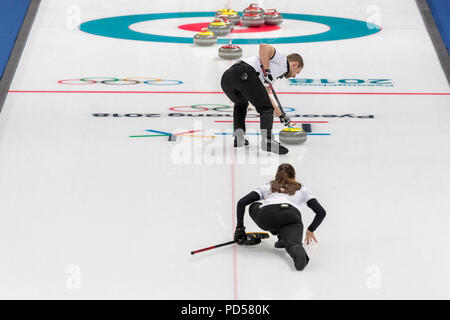 Anastasia BRYZGALOVA  and Aleksandr KRUSHELNITCKII  (OAR) competing in the Mixed Doubles Curling round robin at the Olympic Winter Games PyeongChang 2 Stock Photo