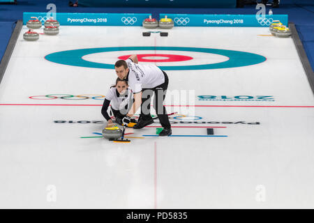 Anastasia BRYZGALOVA  and Aleksandr KRUSHELNITCKII  (OAR) competing in the Mixed Doubles Curling round robin at the Olympic Winter Games PyeongChang 2 Stock Photo