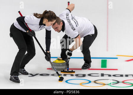 Anastasia BRYZGALOVA  and Aleksandr KRUSHELNITCKII  (OAR) competing in the Mixed Doubles Curling round robin at the Olympic Winter Games PyeongChang 2 Stock Photo