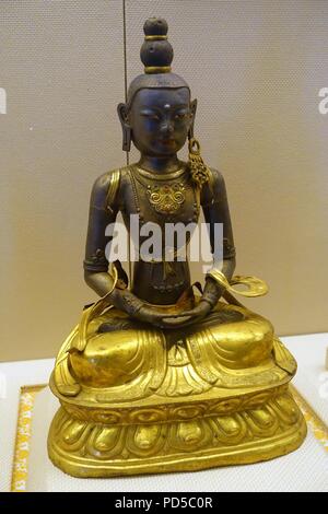 Amitayus Buddha, Tibet, 1644-1911 AD, gilt copper - Stock Photo