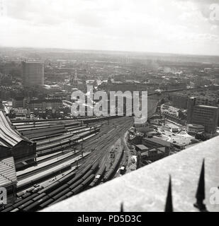 1960s, historical, overhead view of the rail tracks out of Waterloo railway station, London, England, UK and surrounding area. A mainline station, Waterloo was the UK's busiest station in this era. Stock Photo