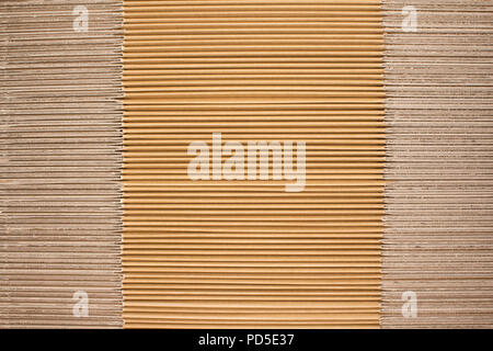 Stack of flat industrial folding cardboard packaging boxes Stock Photo