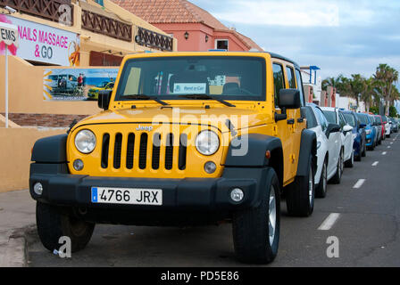 2017 Yellow & Black Jeep Wrangler Sport Unlimited Car front nearside driver side view of yellow and black 2017 model four door 4 x 4 SUV jeep wrangler Stock Photo