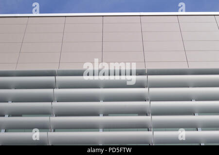 Low angle view of energy efficient window louvers on a tall building providing innovative interior climate control options in an attractive design Stock Photo