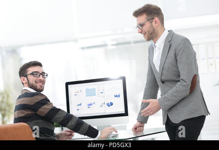 two businessmen analyzing stats financial data Stock Photo