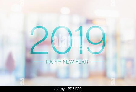 Happy new year 2019 word on blur pale color convention hall office building bokeh background Stock Photo