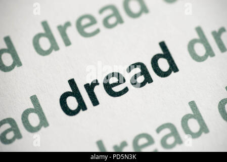 word dread printed on white paper macro Stock Photo