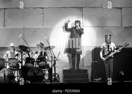 Dortmund, Germany, 20th. Feb.1981 - Roger Waters (in coat) of british psychedelic rock band PINK FLOYD performing THE WALL concert at the Westfalenhalle in Dortmund/Germany (digital image from a b/w-film-negative) Stock Photo