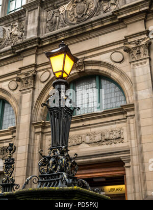 Ornate decorative old Victorian lamp outside Central Library, George IV Bridge, Edinburgh, Scotland, UK Stock Photo