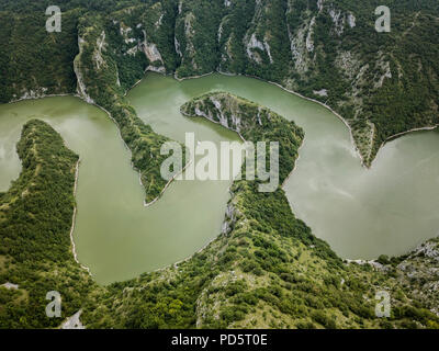 The Uvac Gorge in southern Serbia is especially known for entrenched meanders in a 100 m (330 ft) deep canyon. Stock Photo