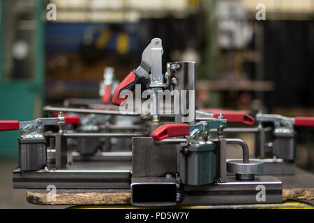 Construction form tool with levers for welding and processing pieces of metal iron or steel in an industrial factory workshop Stock Photo