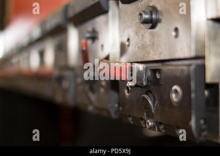 Modern steel sheet metal press hydraulic mechanical construction steel processing machine Stock Photo