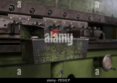 Old rustic classic green vintage retro part control panel on metal steel processing machine.jpg Stock Photo