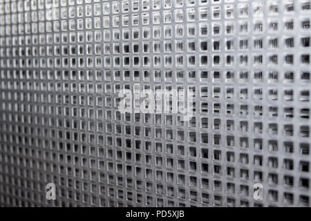 Perforated metal plate steel sheets with grid pattern with abstract grid pattern for industrial processing Stock Photo