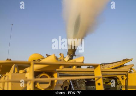 Headquarters Company, 1st Battalion, 155th Infantry Regiment, 155th Armored Brigade Combat Team, Mississippi Army National Guard conducts a mortar live fire training exercise at a range near Camp Buehring, Kuwait, on Aug. 5, 2018, August 5, 2018. (U.S. Army National Guard photo illustration by Spc. Jovi Prevot). () Stock Photo