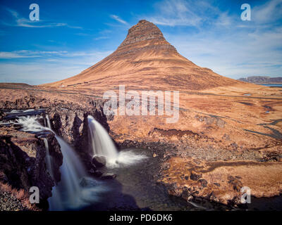 The mountain Kirkjufell and waterfall Kirkjufellsfoss on the Snaefellsnes Peninsula, Iceland. Stock Photo