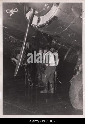 The photo shows a German Junkers Ju 52 transport aircraft with the ...