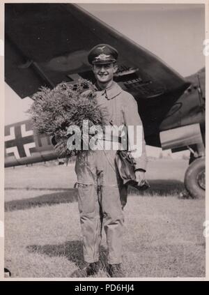 Image from the photo album of Oberleutnant Oscar Müller of  Kampfgeschwader 1: Oberfeldwebel Jürgen of 5./KG 1 after completing 200 missions. Stock Photo