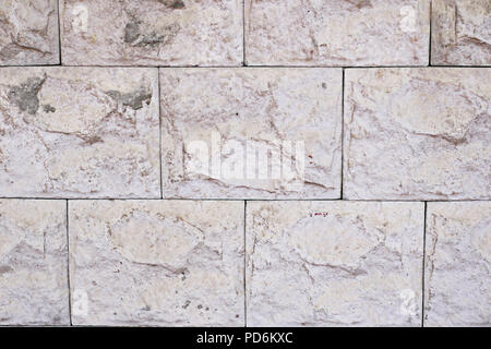 White tiled stone wall texture background with space for text Stock Photo