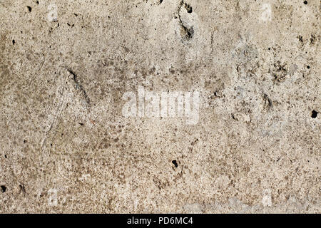 Natural stone surface with drips and dirt. Distressed texture in beige shades. Obsolete concrete floor top view photo. Warm concrete texture photo for Stock Photo