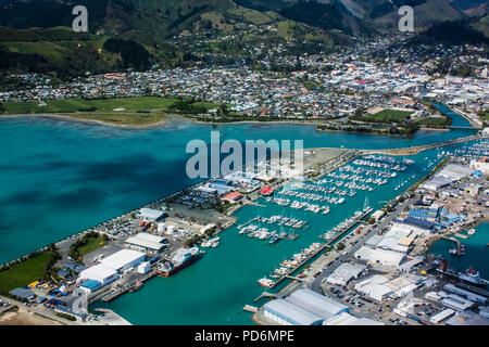 Picton harbor view from above with yachts and ships on turquoise water and rolling hills in the background Stock Photo
