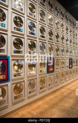 A wall of gold records at the Country Music Hall of Fame in Nashville ...