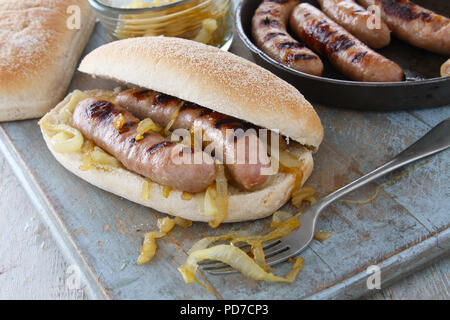 sausage buns with fried onions Stock Photo