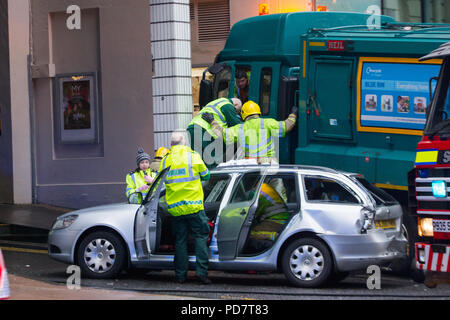 Glasgow bin lorry crash. Fire and paramedic crews attend to the injured at the scene of the horrific incident in Glasgow.  22 December 2014 Stock Photo