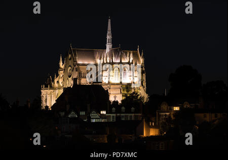 Arundel Cathedral lit up at night. It's a Roman Catholic cathedral with the architecture style of Gothic Revival. In Arundel, West Sussex, England, UK Stock Photo