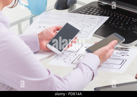 Designer working at new mobile applications Stock Photo