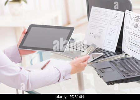 Designer working at new mobile applications Stock Photo