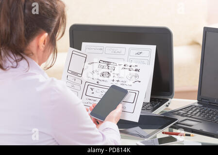 Designer working at new mobile applications Stock Photo
