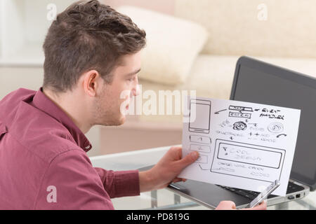 Designer or programmer working at new mobile applications Stock Photo