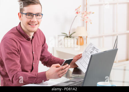 Designer or programmer working at new mobile applications Stock Photo